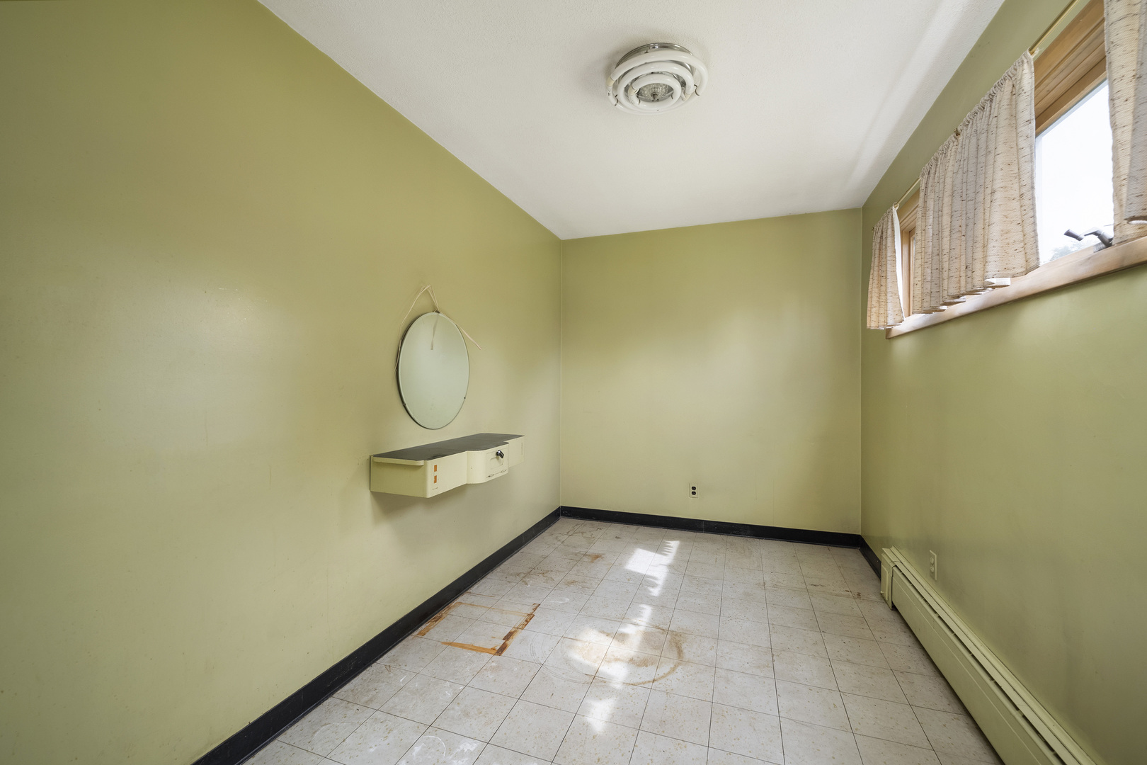 1410 Middletree Road Joliet, IL 60433 - Photo 6 of 28 a view of a room with racks on the wall