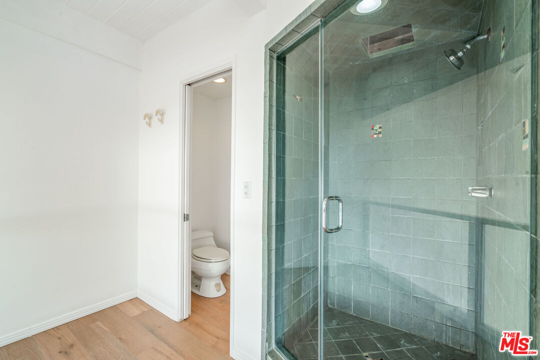 3711 Ocean Front Walk, Unit 3 Marina del Rey, CA 90292 - Photo 15 of 43 a bathroom with a shower and a toilet