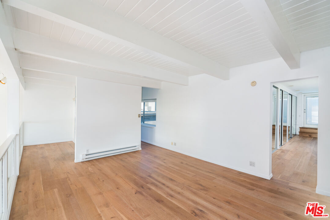 3711 Ocean Front Walk, Unit 3 Marina del Rey, CA 90292 - Photo 16 of 43 a view of empty room with wooden floor
