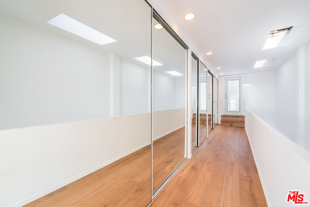 3711 Ocean Front Walk, Unit 3 Marina del Rey, CA 90292 - Photo 17 of 43 a view of a hallway with wooden floor