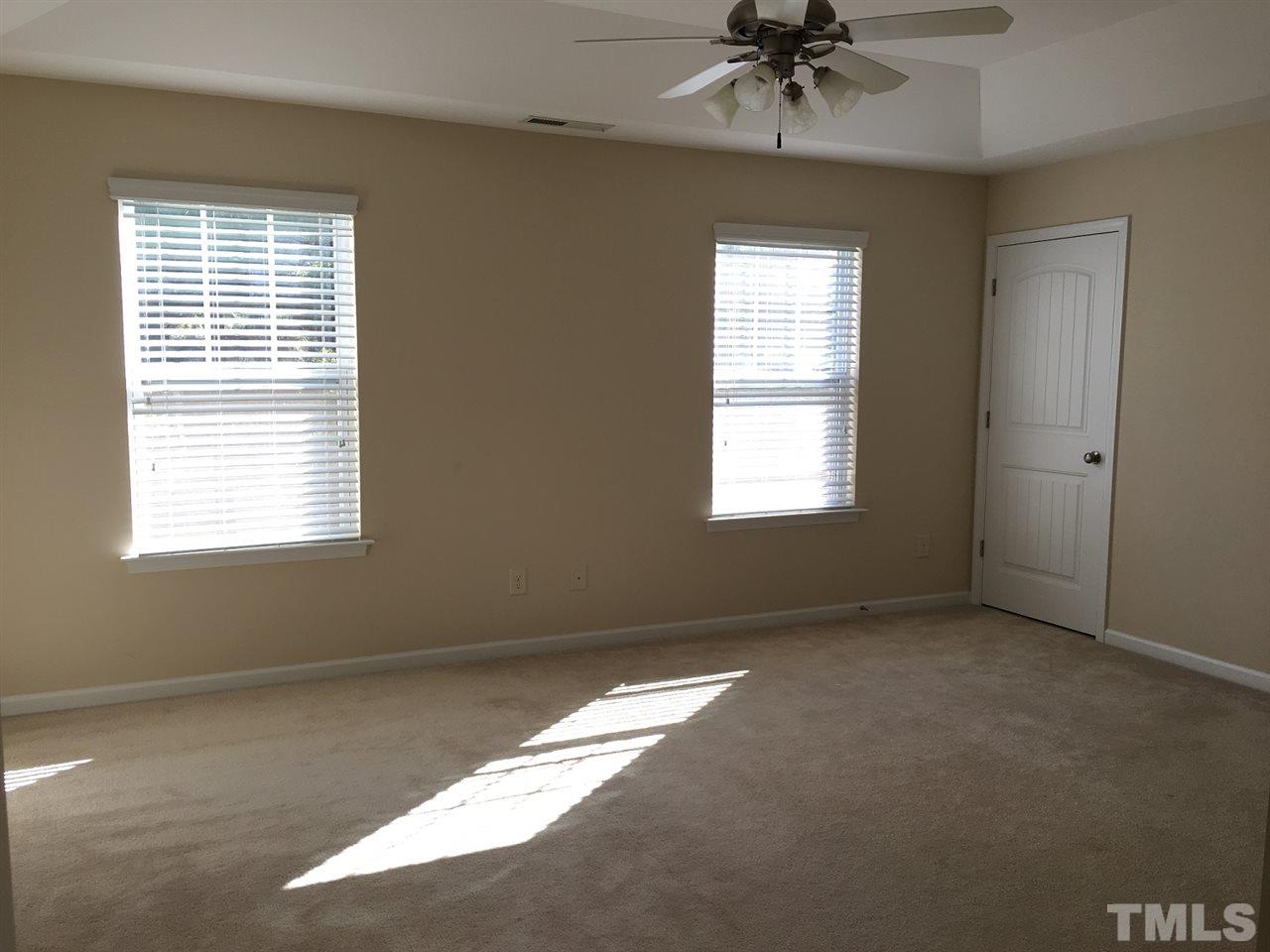 2423 Swans Rest Way Raleigh, NC 27606 - Photo 11 of 25 a view of an empty room with a window