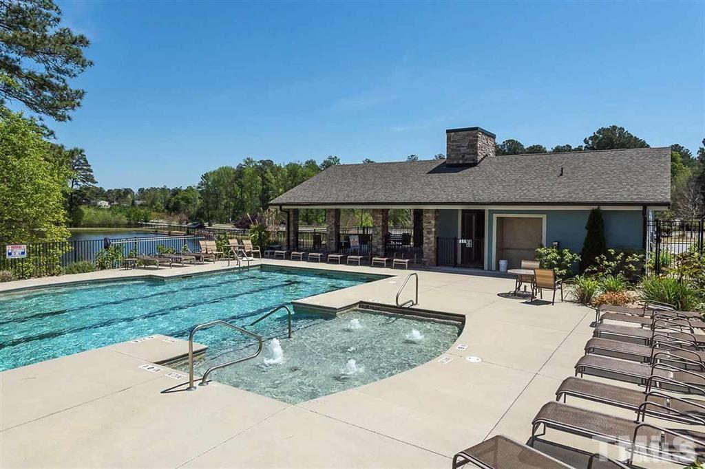2423 Swans Rest Way Raleigh, NC 27606 - Photo 23 of 25 a view of a house with swimming pool and sitting area