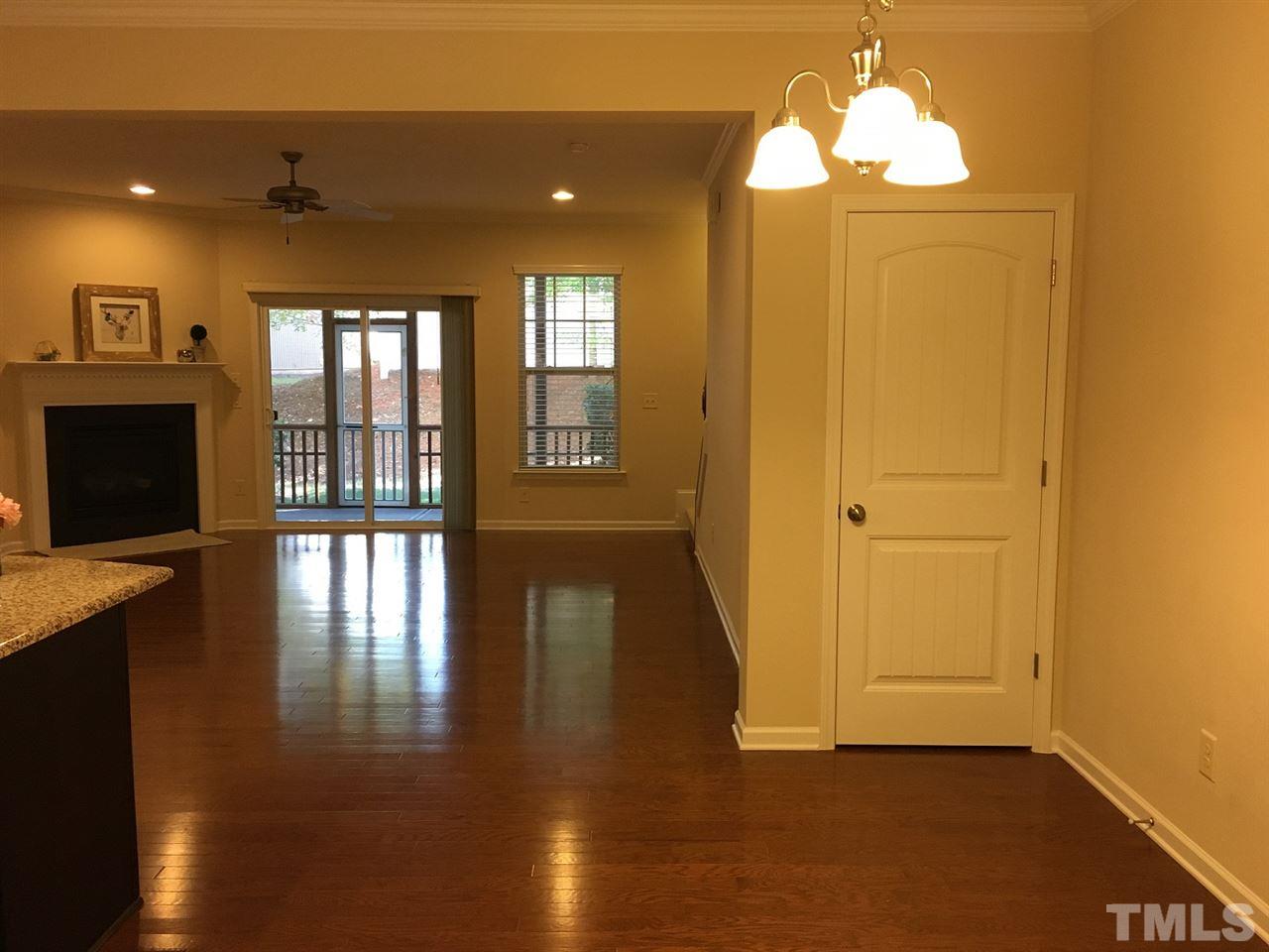 2423 Swans Rest Way Raleigh, NC 27606 - Photo 9 of 25 a view of a livingroom with a fireplace