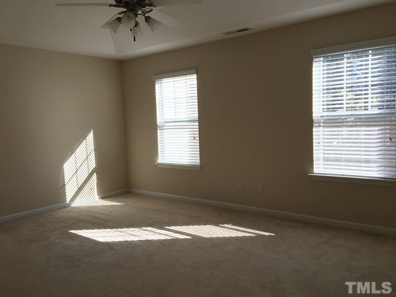 2423 Swans Rest Way Raleigh, NC 27606 - Photo 10 of 25 an empty room with a window