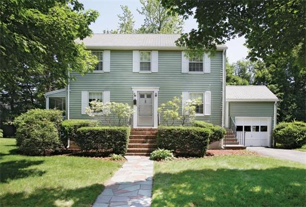 64 Longfellow Road Newton, MA 02462 - Photo 1 of 7 a front view of a house with a garden