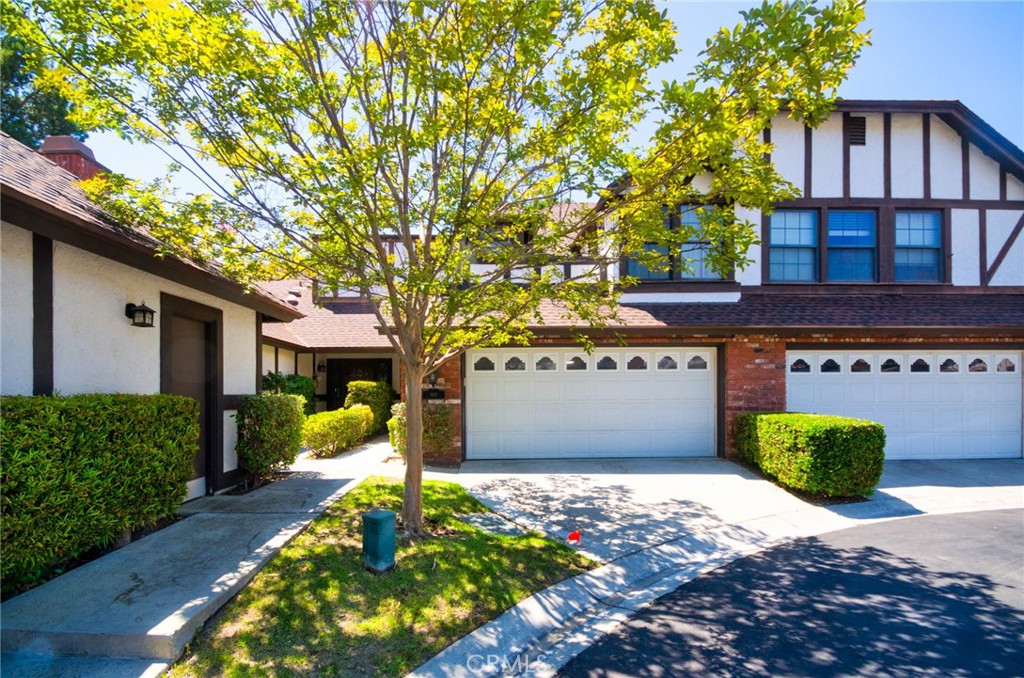 950 South Rim Crest Drive Anaheim Hills, CA 92807 - Photo 38 of 40 a front view of a house with a yard