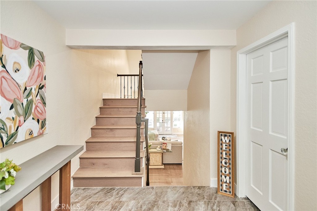 950 South Rim Crest Drive Anaheim Hills, CA 92807 - Photo 6 of 40 a view of entryway with wooden floor and stairs