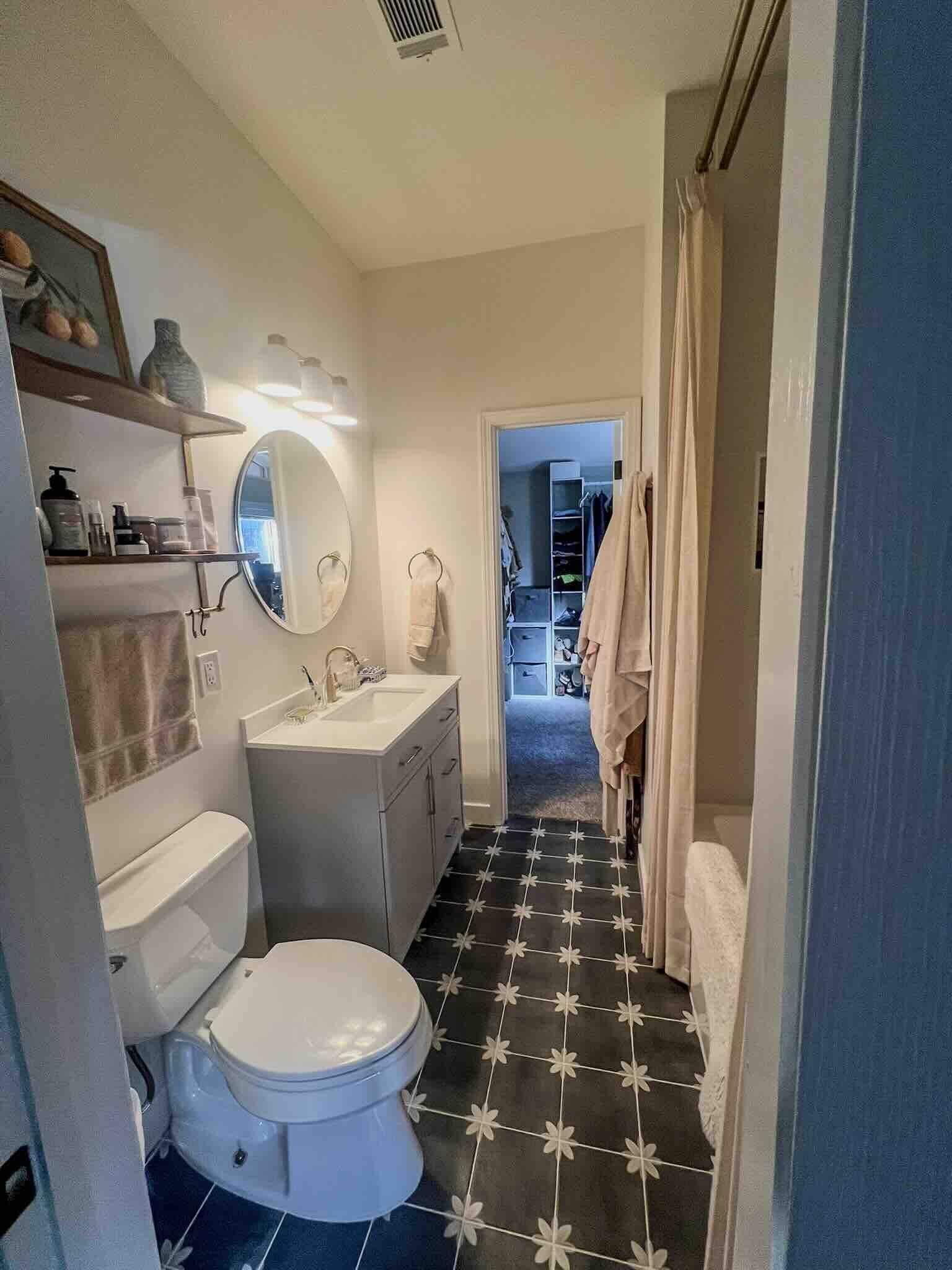 2578 Elmore Park Road Bartlett, TN 38134 - Photo 9 of 24 a bathroom with a sink toilet and shower