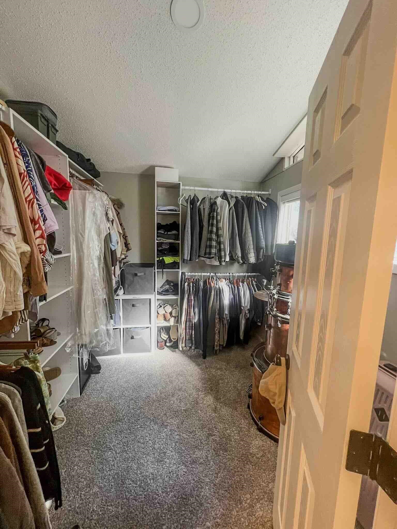2578 Elmore Park Road Bartlett, TN 38134 - Photo 10 of 24 a view of walk in closet with clothes and shoes