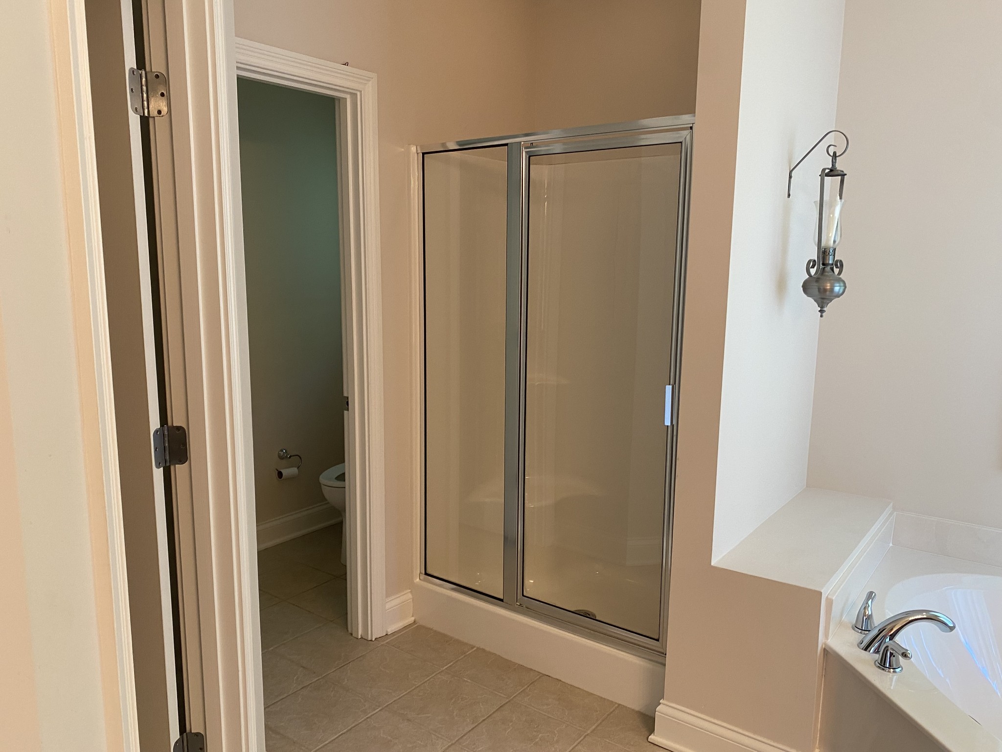 720 Heritage Road Lebanon, TN 37087 - Photo 16 of 31 a bathroom with a shower and a sink