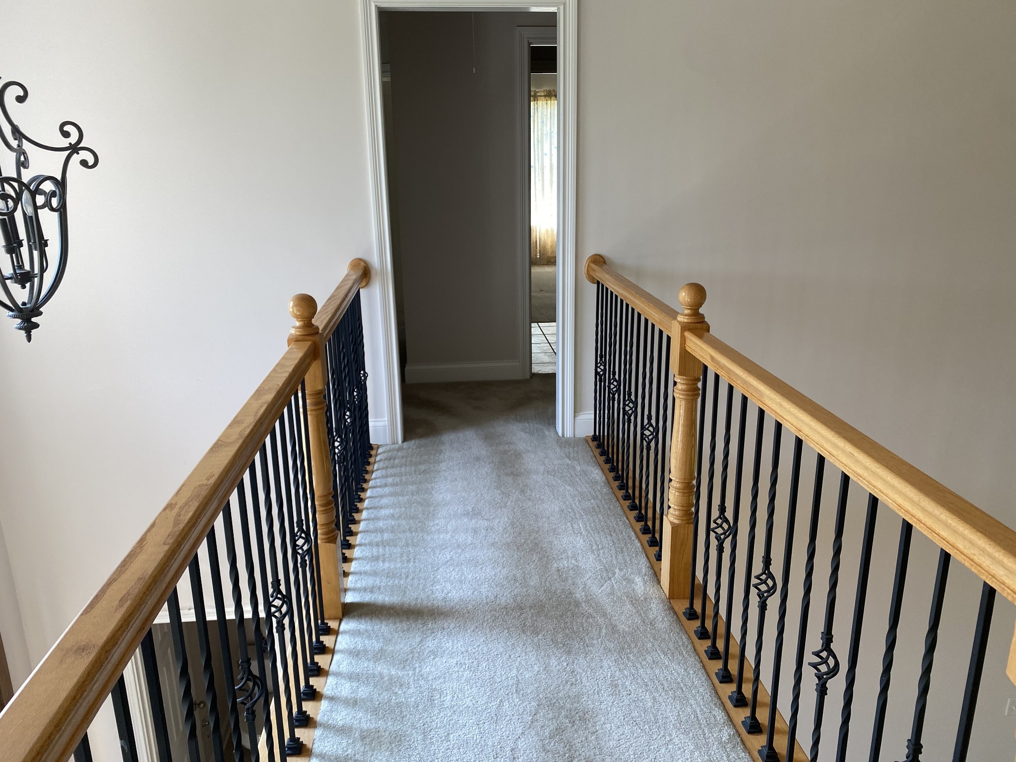 720 Heritage Road Lebanon, TN 37087 - Photo 22 of 31 a view of a hallway with wooden floor and stairs