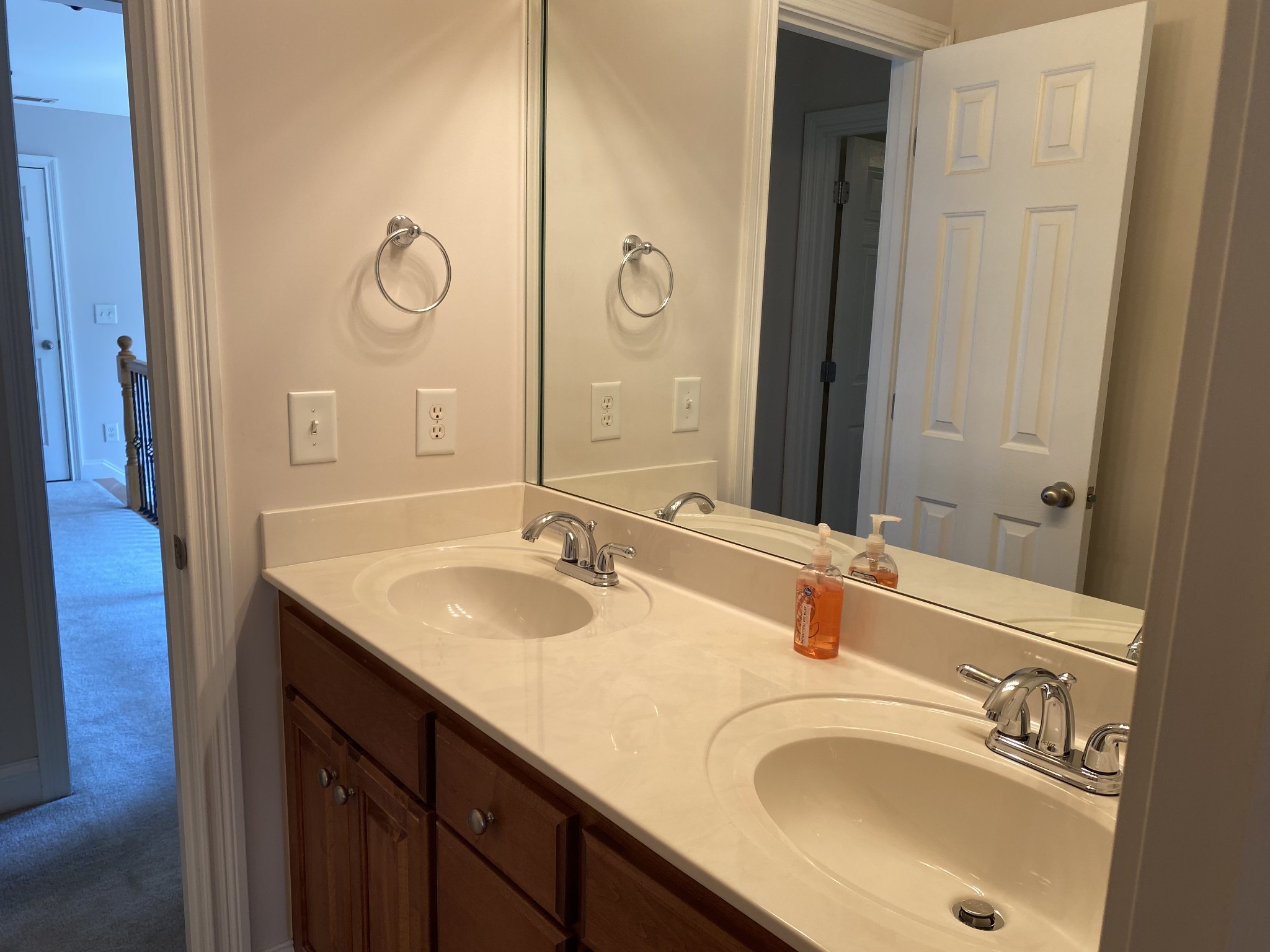 720 Heritage Road Lebanon, TN 37087 - Photo 28 of 31 a bathroom with a granite countertop sink a mirror and a shower