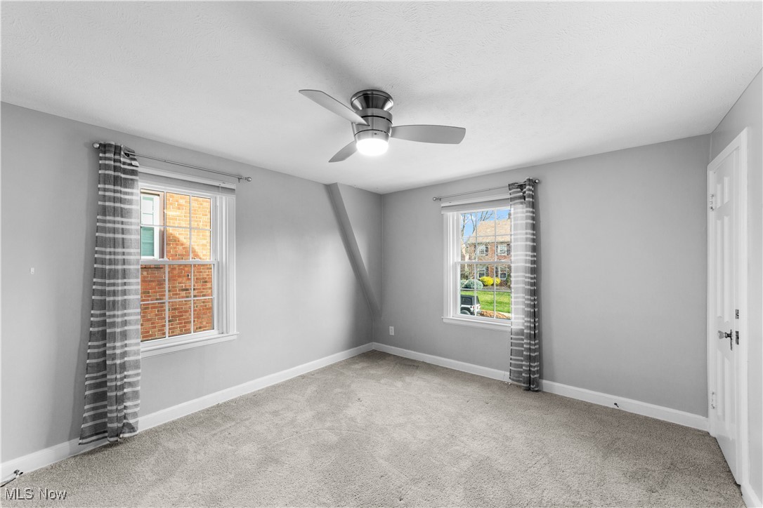 2492 Channing Road Cleveland, OH 44118 - Photo 9 of 14 Carpeted empty room featuring ceiling fan