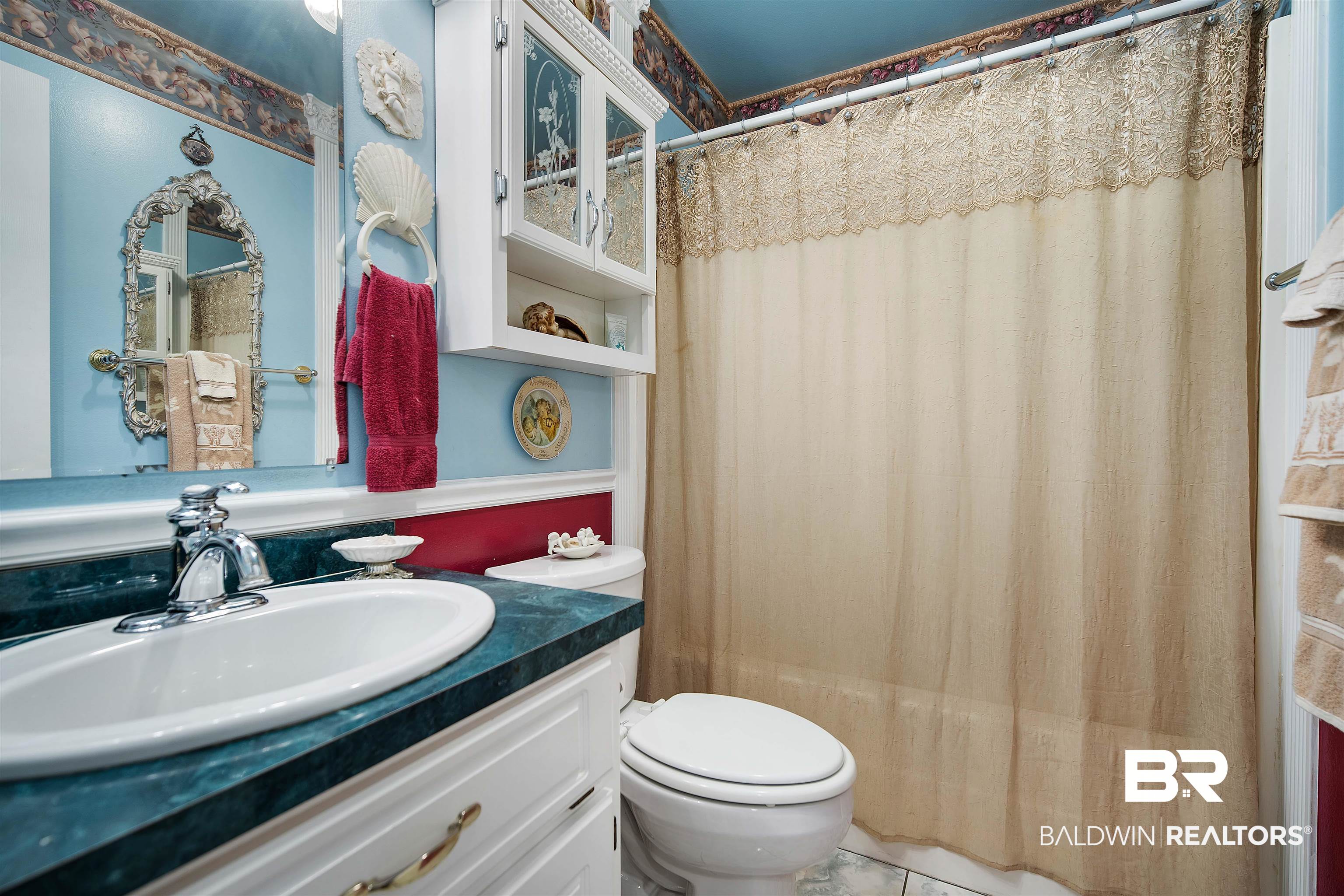 1744 Aden Road Mobile, AL 36695 - Photo 22 of 35 Bathroom featuring toilet, vanity, and tile patterned floors