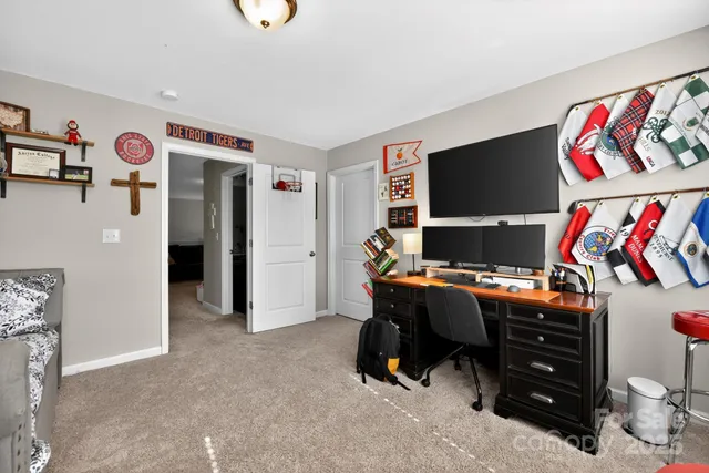 a view of a workspace with furniture