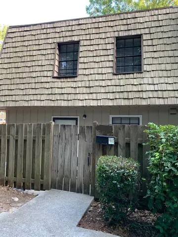 a bathroom with a sink toilet and mirror