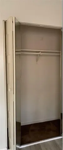 a white bath tub sitting next to a white toilet and sink