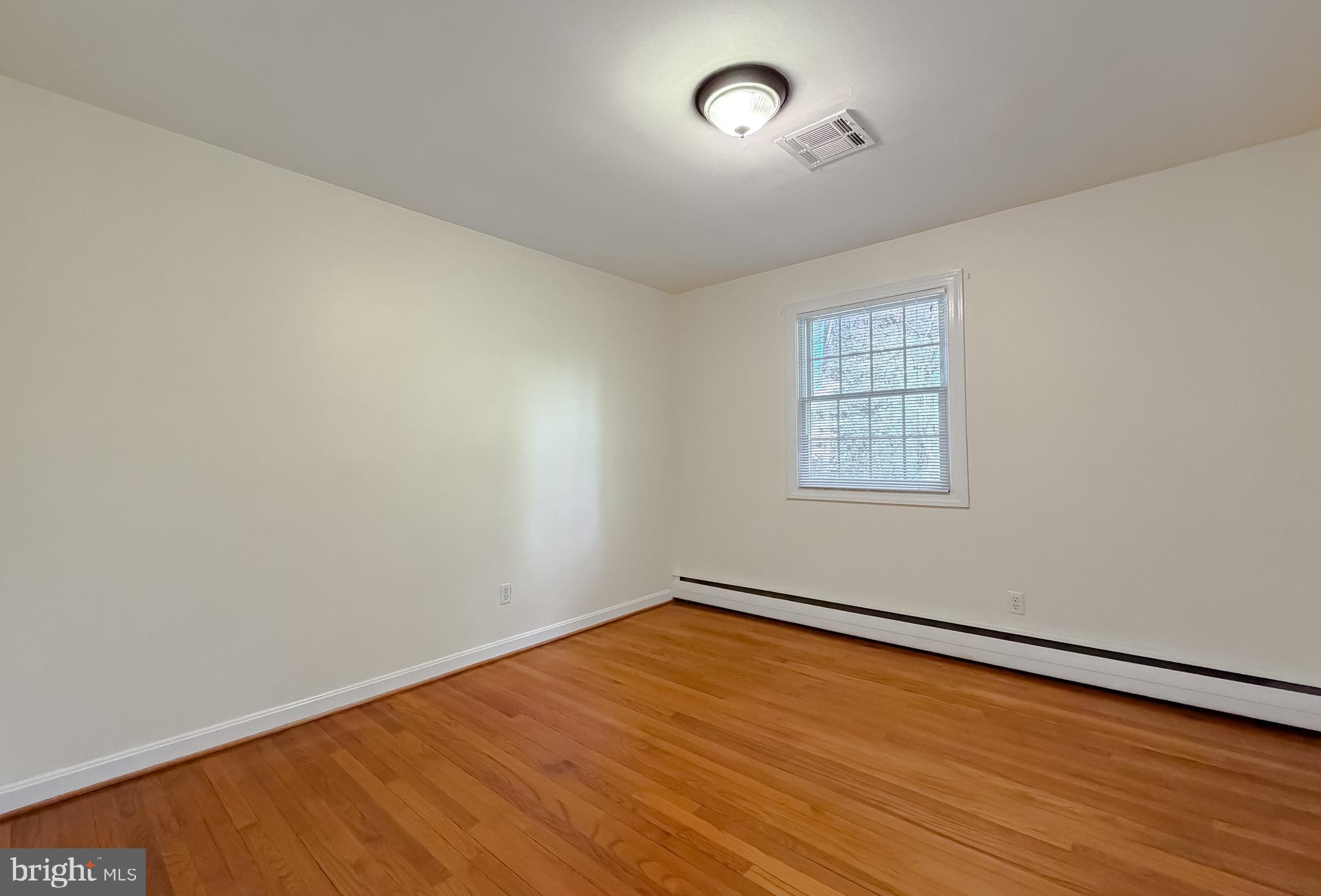 19479 North Snow Hill Manor Road Lexington Park, MD 20653 - Photo 29 of 34 an empty room with a window