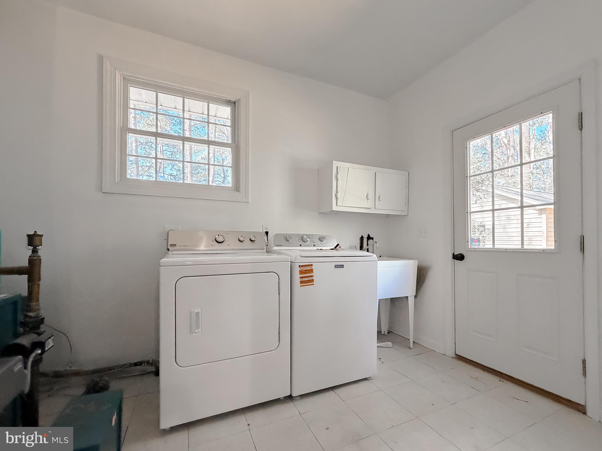 19479 North Snow Hill Manor Road Lexington Park, MD 20653 - Photo 31 of 34 a utility room with dryer and washer