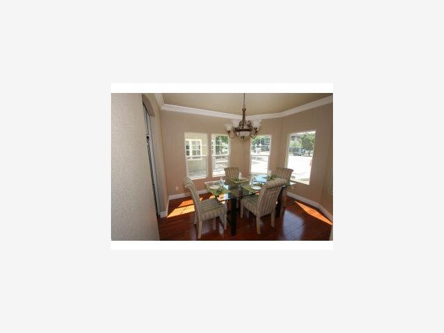 831 Monroe Street Santa Clara, CA 95050 - Photo 3 of 9 a living room with couches and painted walls