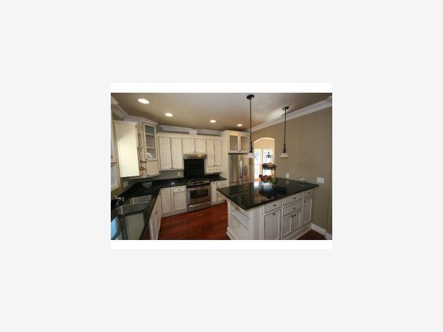 831 Monroe Street Santa Clara, CA 95050 - Photo 4 of 9 a living room with furniture and a mirror