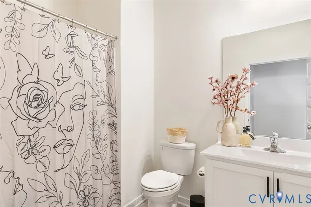 a bathroom with a sink and a toilet