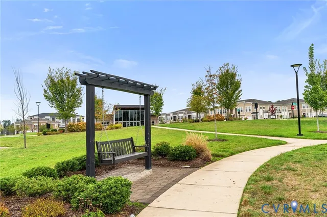 a view of a park with large trees