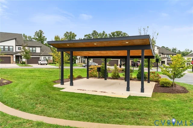 a view of yard with an outdoor seating