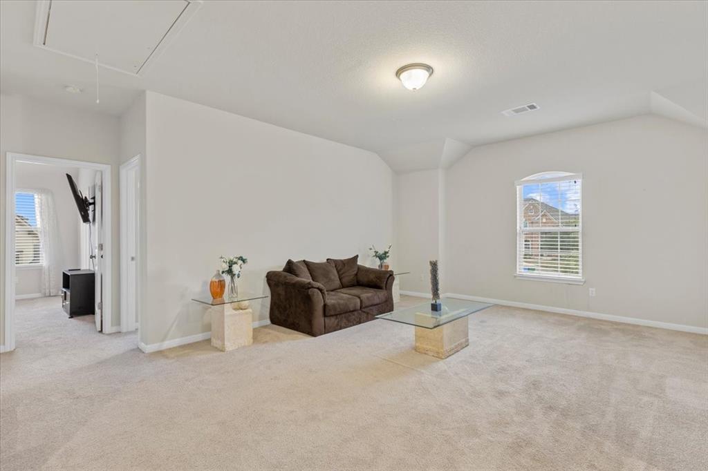11306 Runnel Ridge Road Manor, TX 78653 - Photo 20 of 26 a living room with furniture