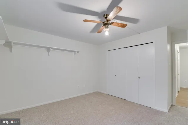 a view of a room with a fan