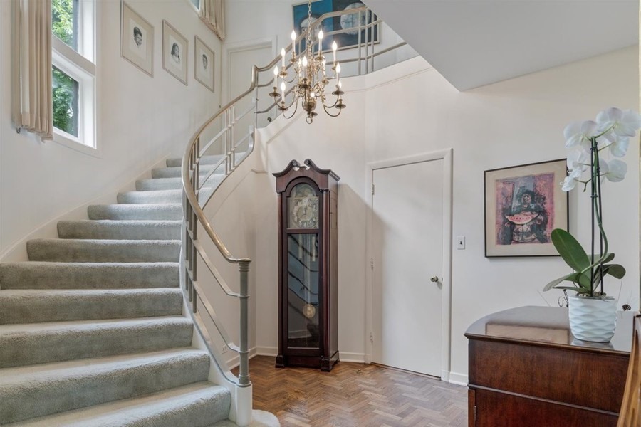 589 Greenleaf Avenue Glencoe, IL 60022 - Photo 25 of 40 a view of entryway and hall with wooden floor