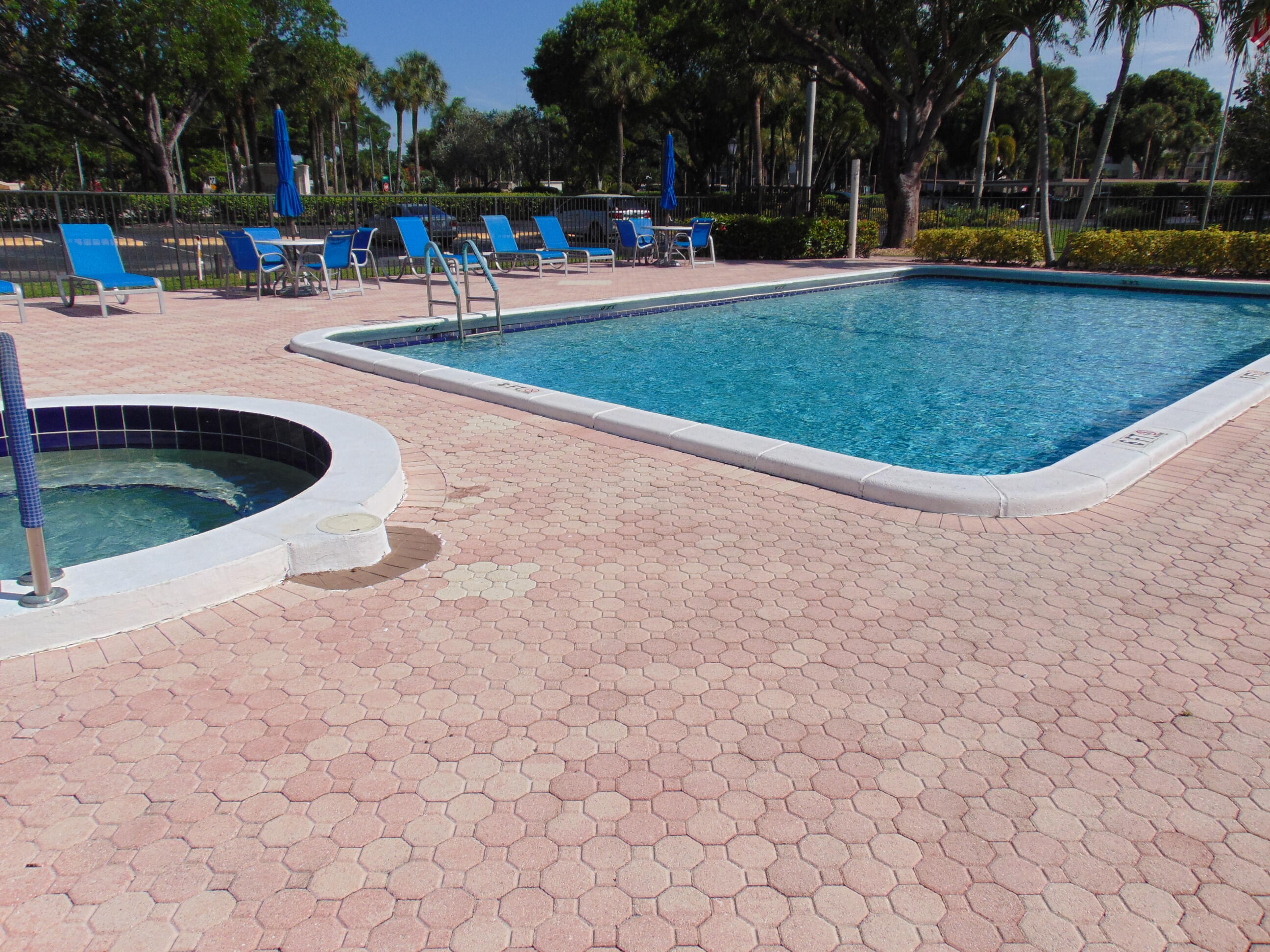 9220 Southwest 14th Street, Unit 3103 Boca Raton, FL 33428 - Photo 52 of 58 a view of outdoor space with swimming pool and patio