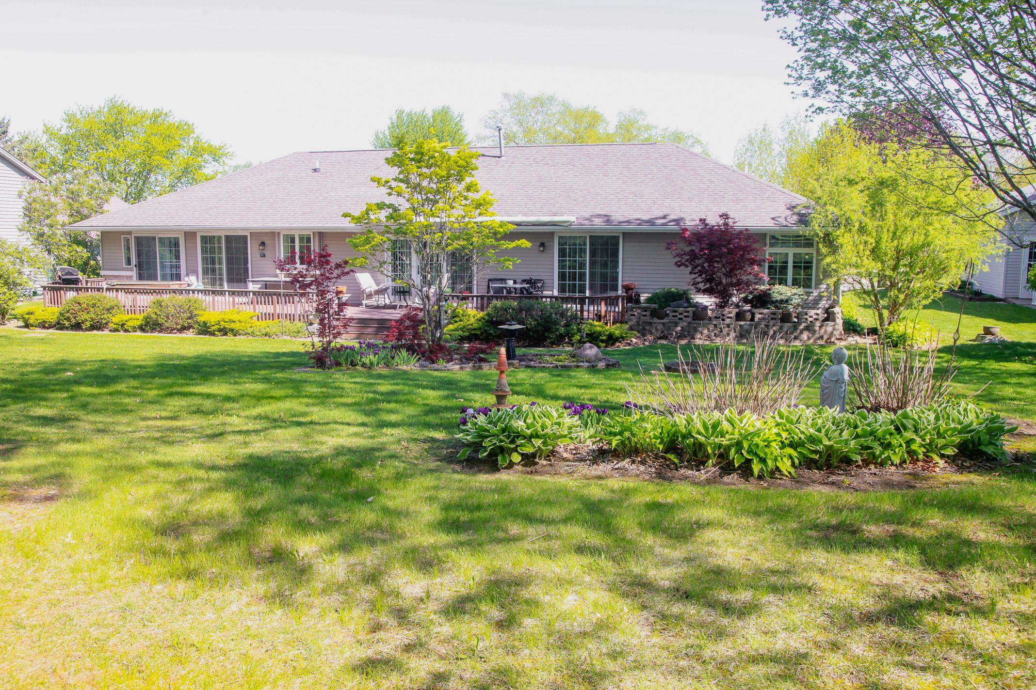 3001 Countryside Lane Freeport, IL 61032 - Photo 43 of 47 a front view of house with yard and swimming pool