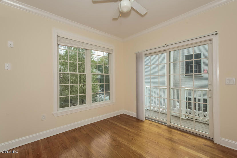 25 Decatur Street, Unit A Cos Cob, CT 06807 - Photo 14 of 29 a view of an empty room with a window