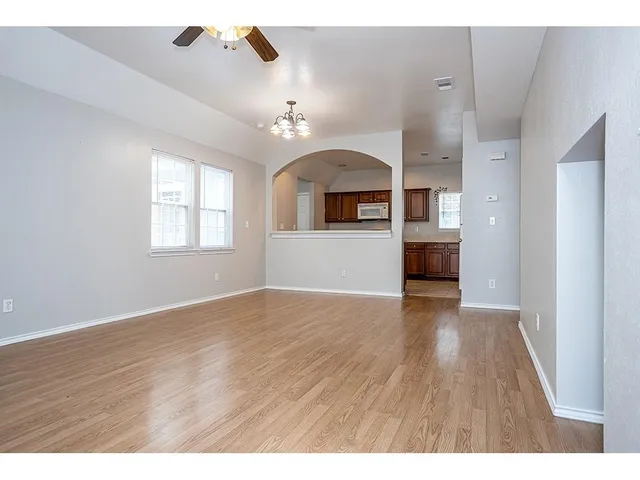 a view interior of a house wooden floor and windows