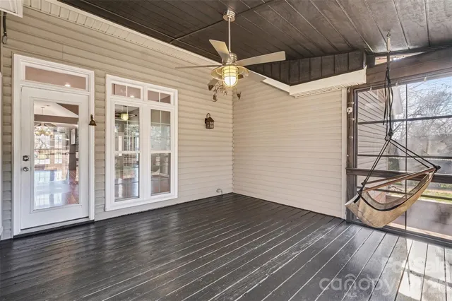 a view of a livingroom with wooden floor