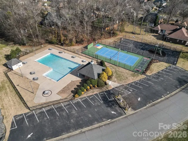 an aerial view of a house with a ocean view
