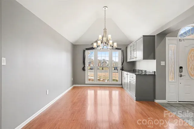 a very nice looking room with a chandelier