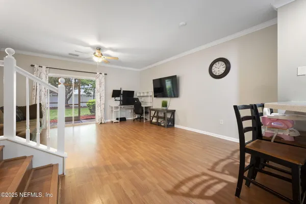 a view of a livingroom from a hallway