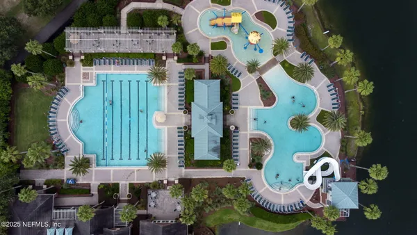 a bathroom with a glass door shower