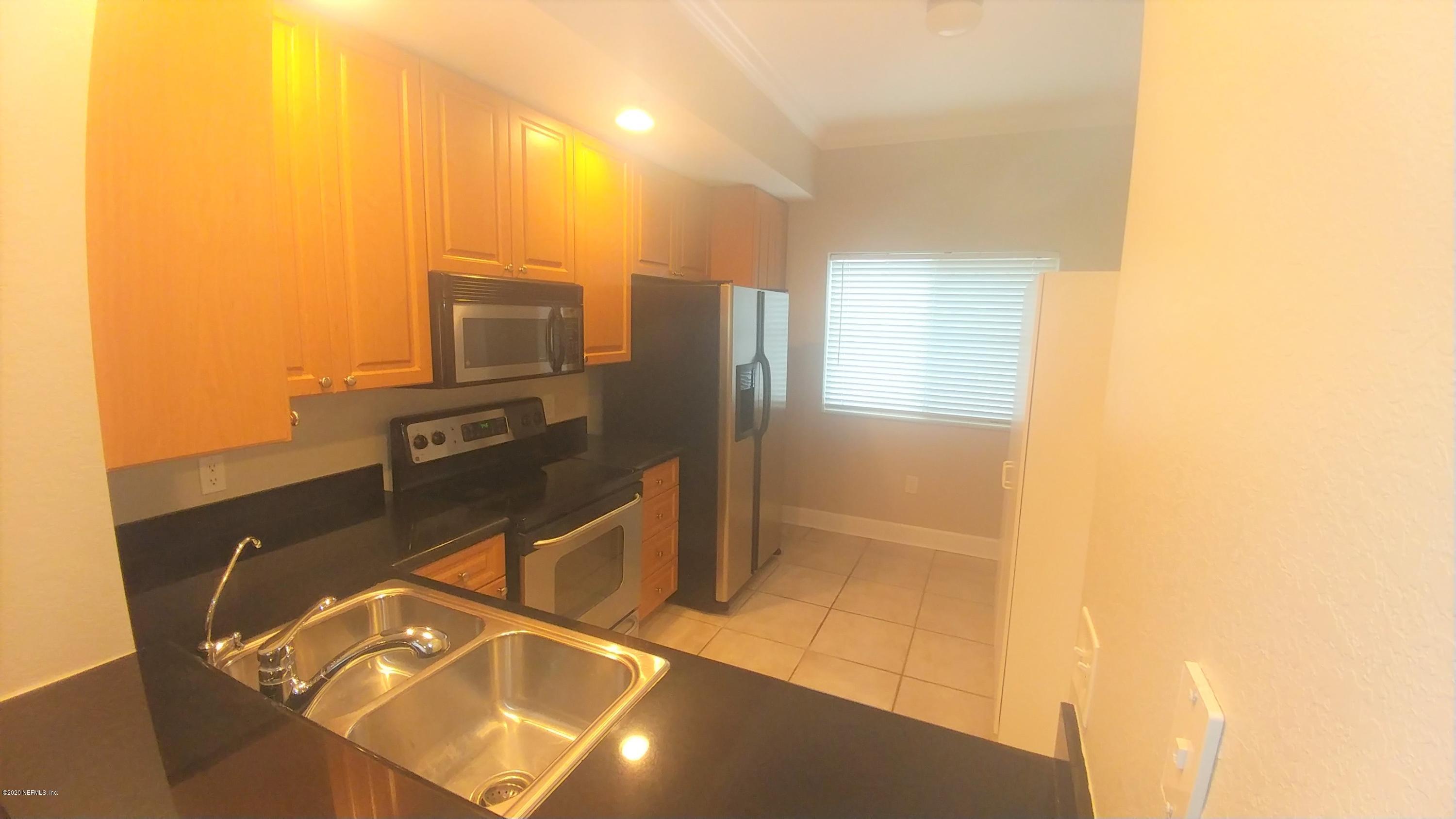 9745 Touchton Road, Unit 1729 Jacksonville, FL 32246 - Photo 3 of 10 Kitchen 2