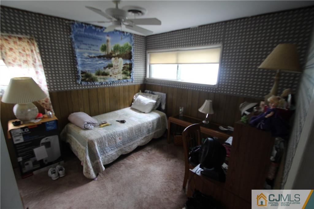 3 Vernon Road Edison, NJ 08817 - Photo 13 of 16 a bed room with a bed and a window