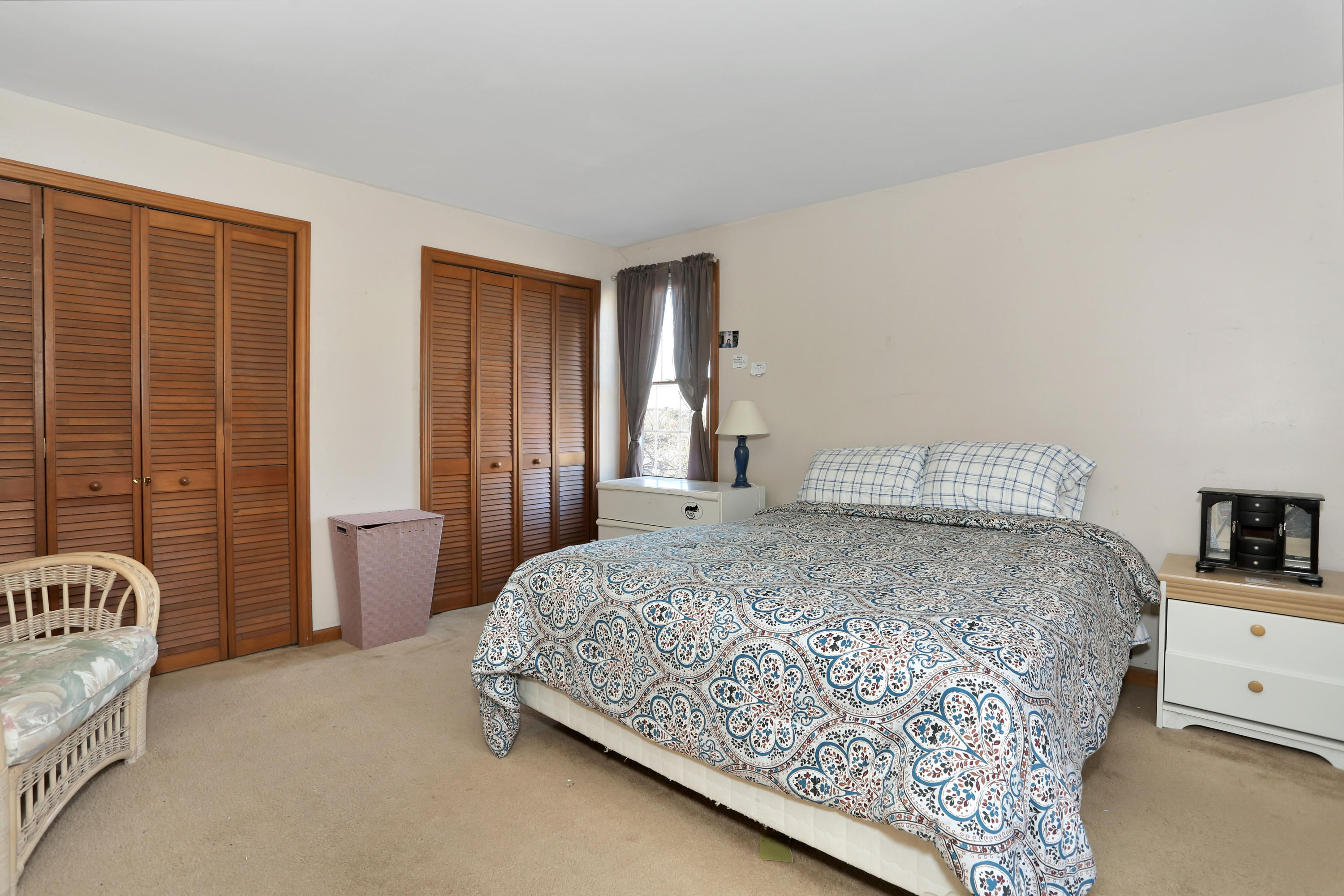 188 Camelback Road Marstons Mills, MA 02648 - Photo 13 of 22 a bedroom with a bed and a couch