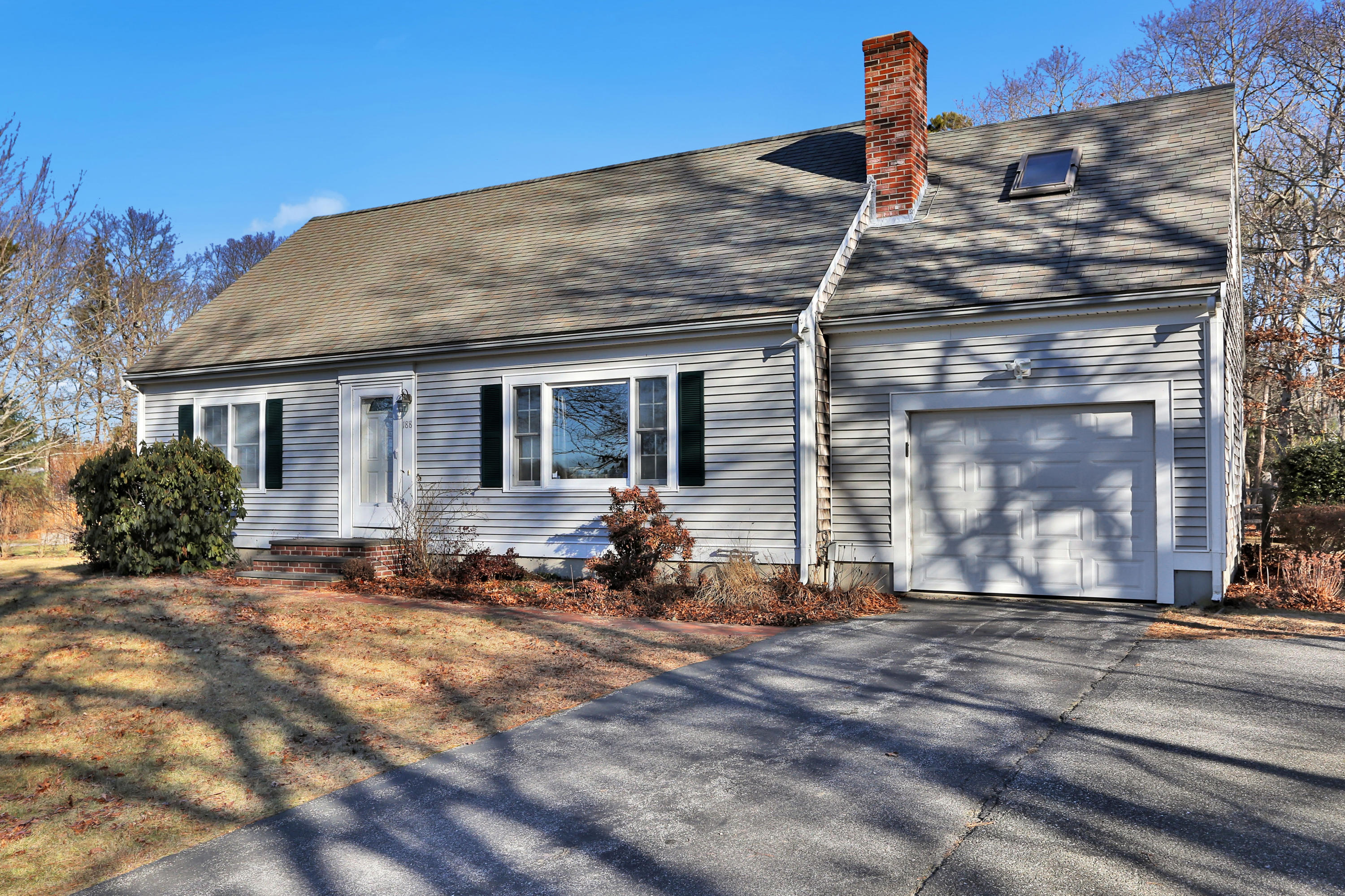 188 Camelback Road Marstons Mills, MA 02648 - Photo 20 of 22 a front view of a house with a yard