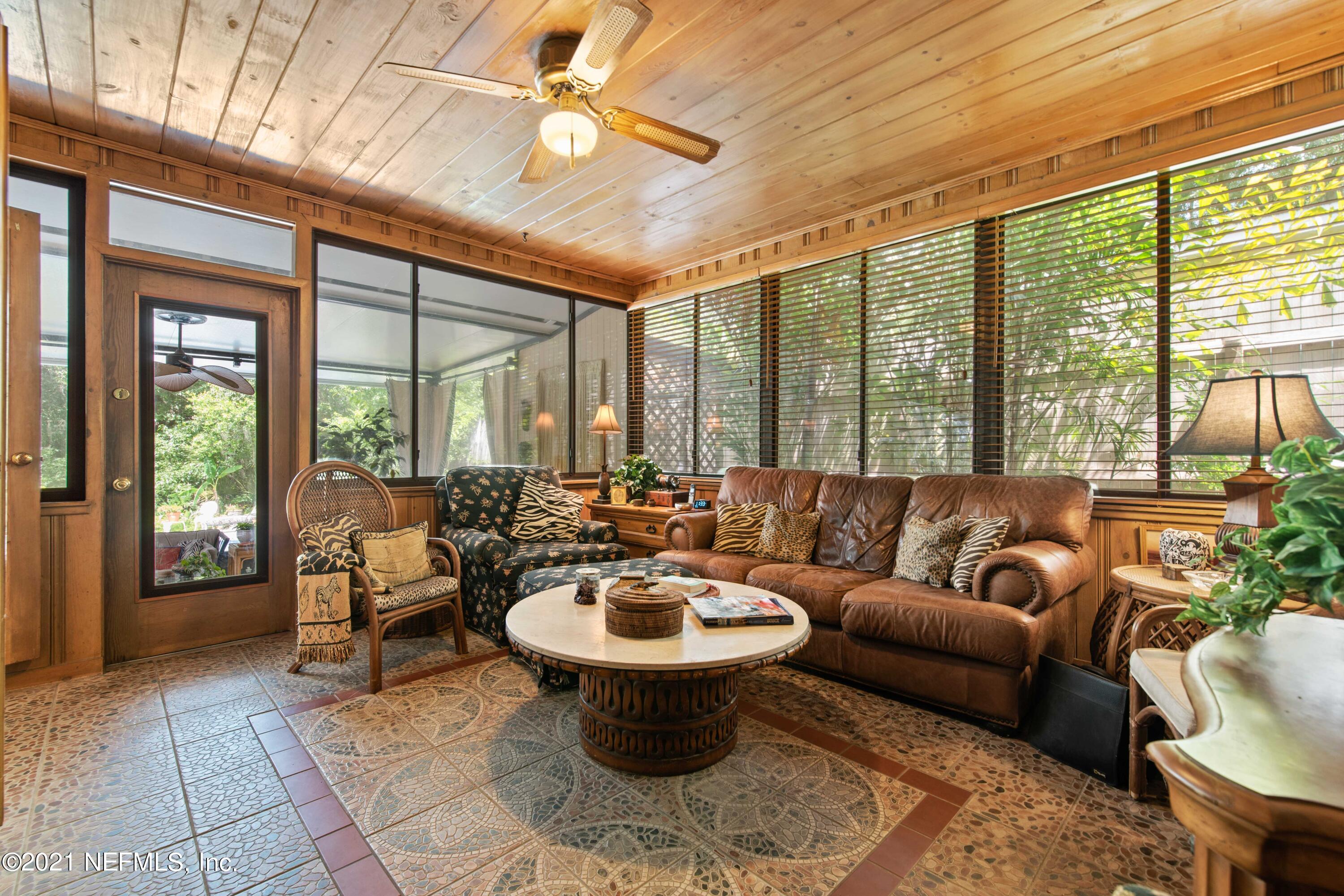 6514 Colgate Road Jacksonville, FL 32217 - Photo 14 of 31 a living room with furniture and a large window