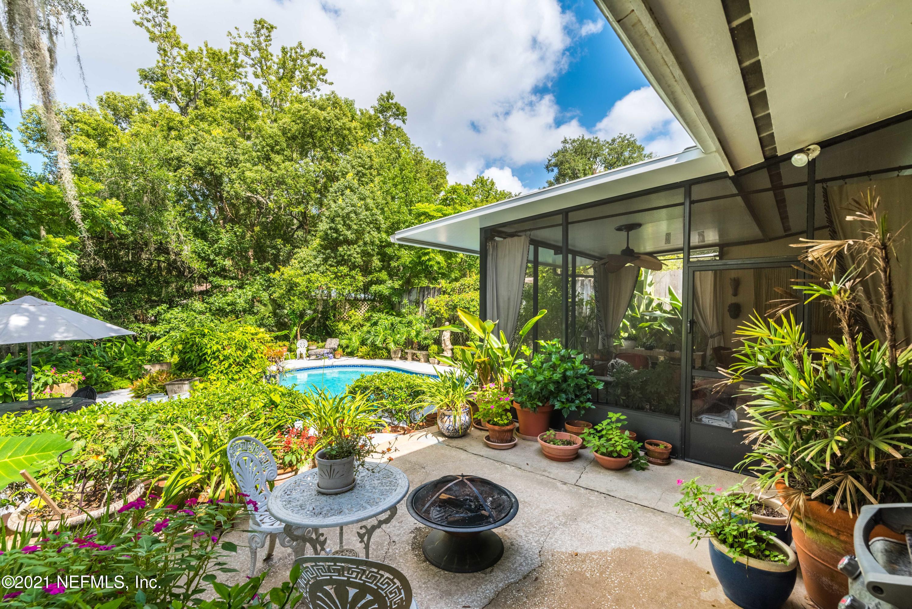 6514 Colgate Road Jacksonville, FL 32217 - Photo 24 of 31 a view of a chair and table in a garden