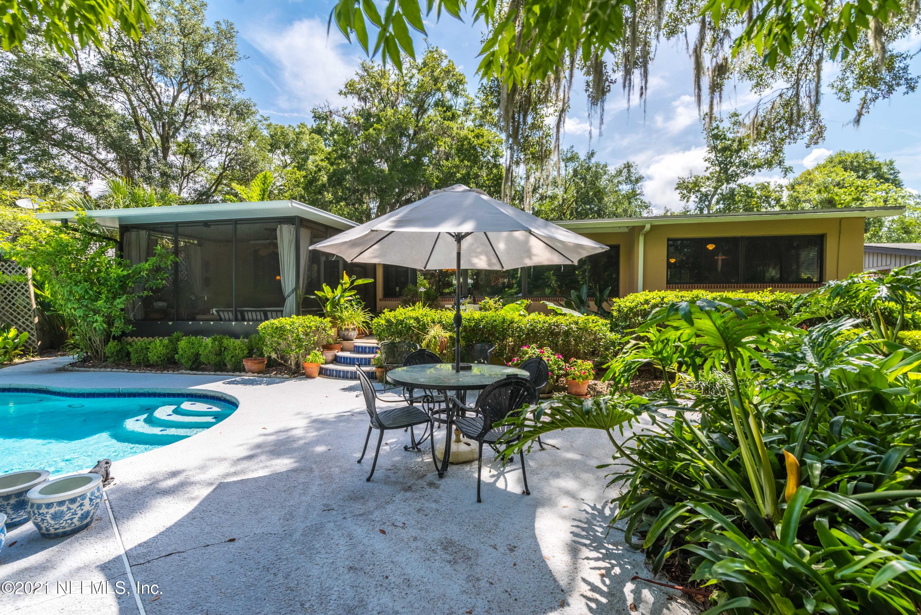 6514 Colgate Road Jacksonville, FL 32217 - Photo 27 of 31 a view of a backyard with furniture and a garden