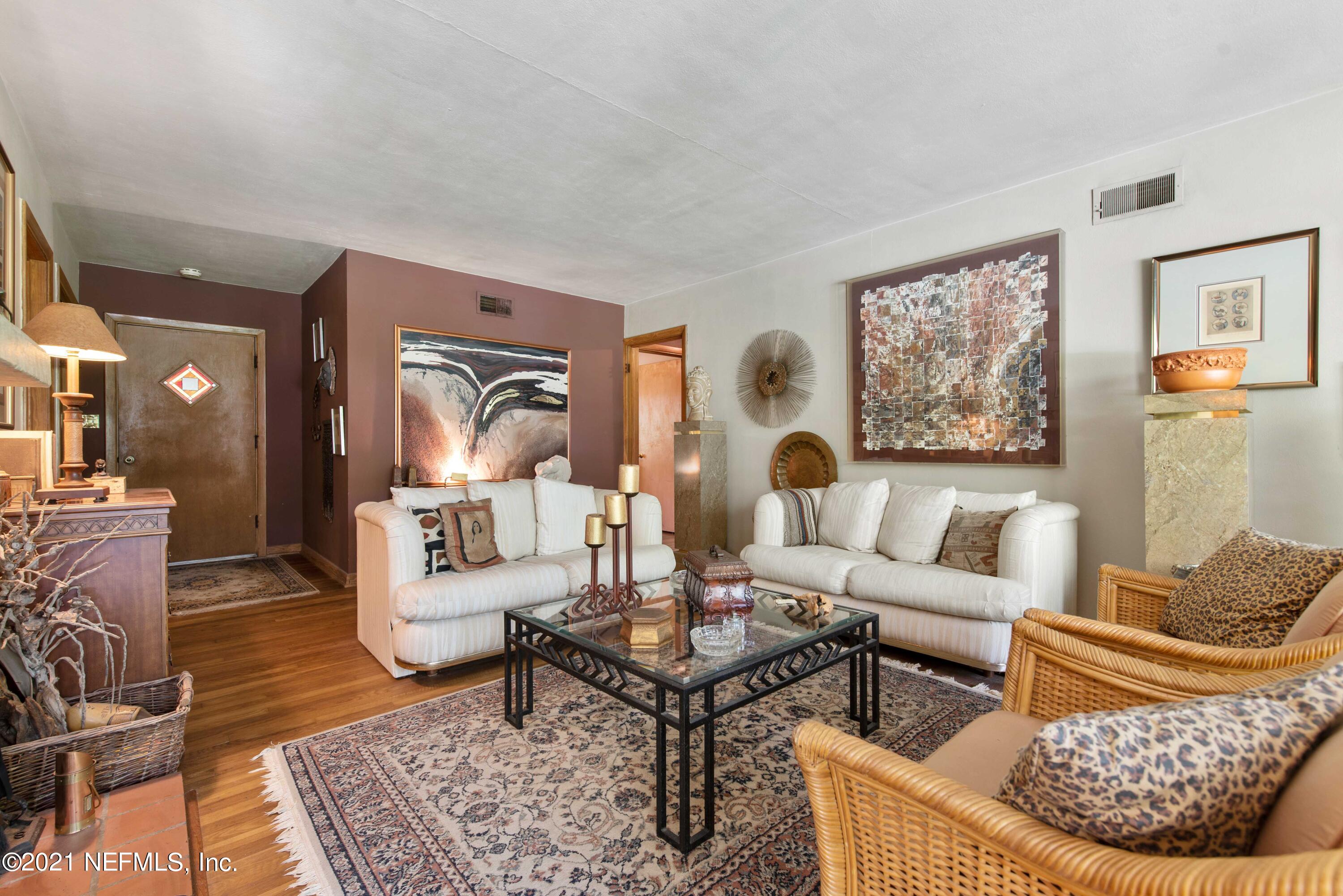 6514 Colgate Road Jacksonville, FL 32217 - Photo 5 of 31 a living room with furniture and a rug