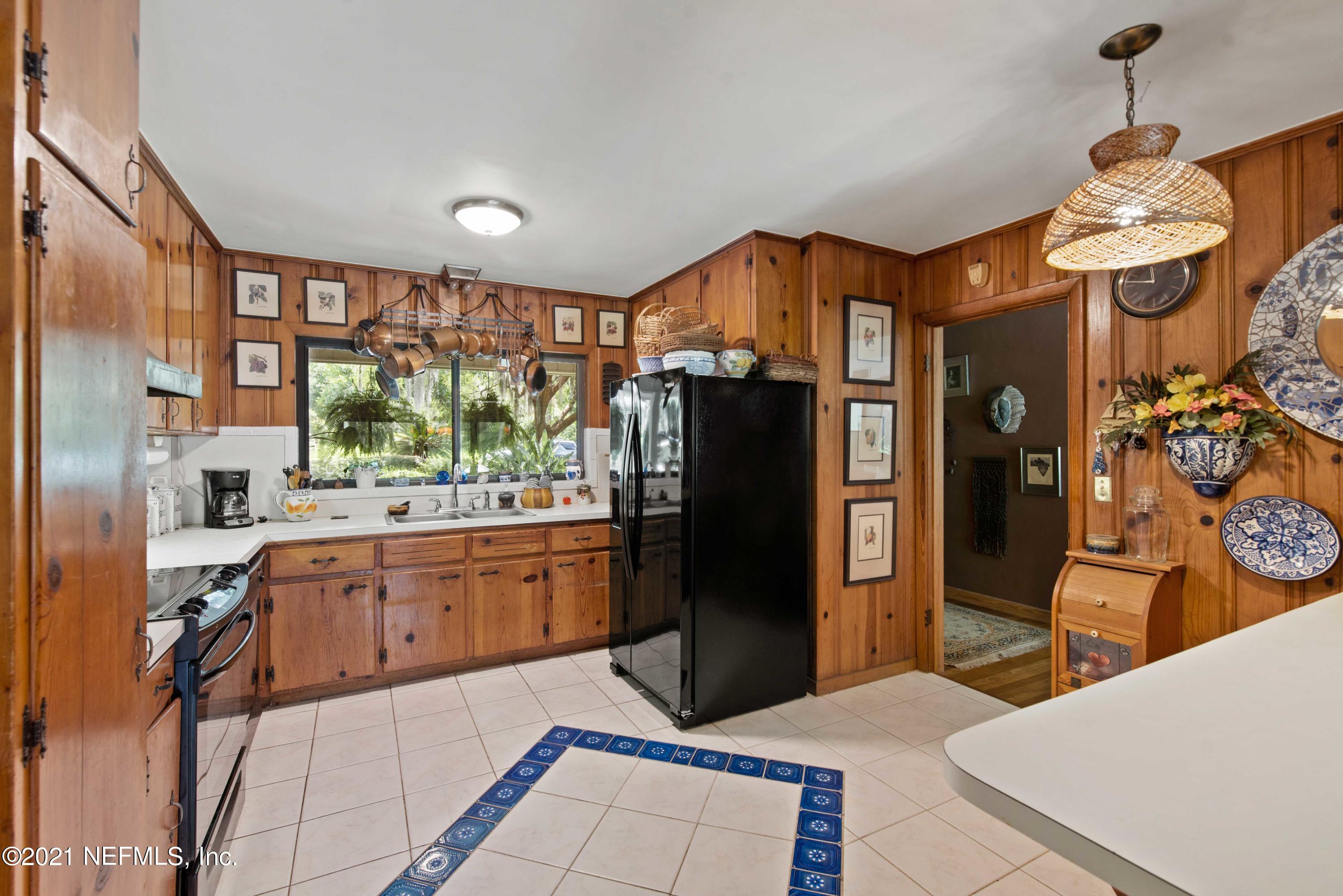 6514 Colgate Road Jacksonville, FL 32217 - Photo 9 of 31 a kitchen with stainless steel appliances granite countertop a refrigerator and a sink
