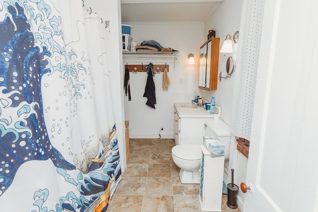 269 Ashfield Road Conway, MA 01341 - Photo 14 of 25 a bathroom with a toilet sink and mirror